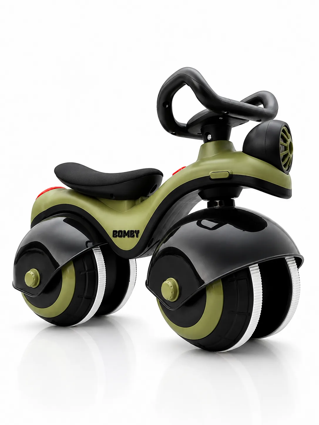 Bomby ride-on in green, three-quarter studio view